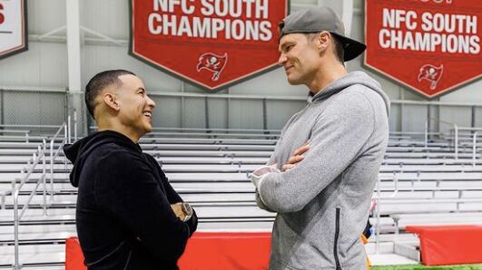 Daddy Yankee y Tom Brady